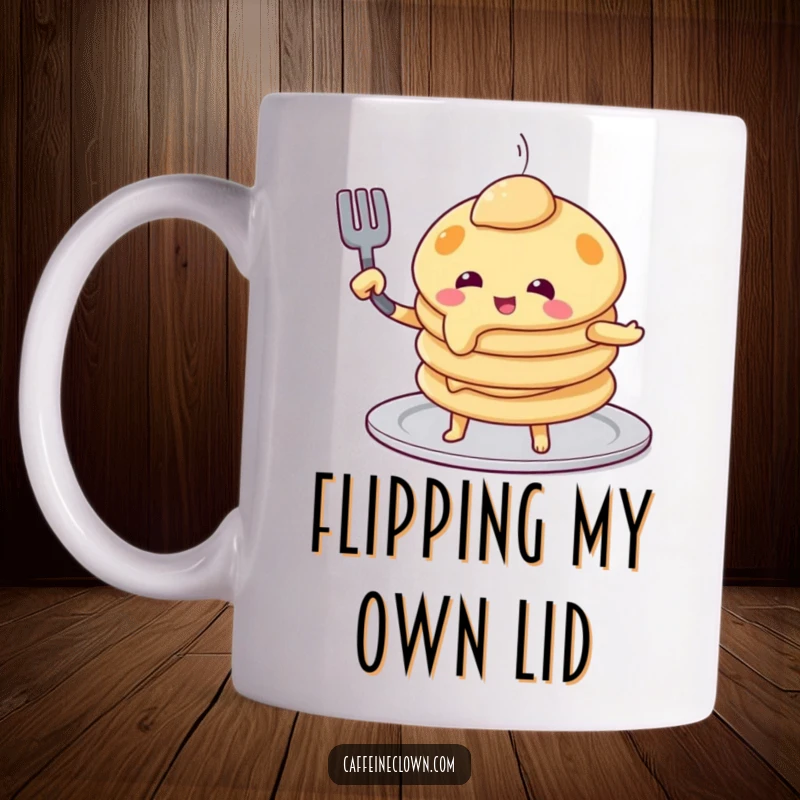 Funny pancake mug showing a playful pancake character attempting to flip itself with a spatula, a comical breakfast illustration.